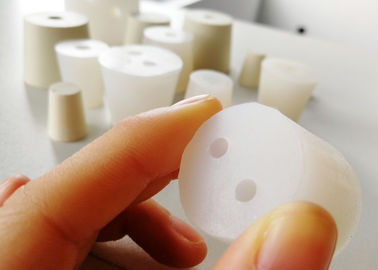 Tappi in gomma di silicone a un buco di laboratorio per bottiglie, provette e flaconi di chimica